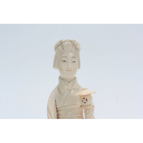 197 - A LATE 19th CENTURY CHINESE IVORY SCULPTURE modelled as Guanyin with buddha crown 24.5cm high