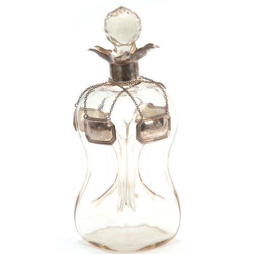 20 - A GEORGE V SILVER MOUNTED SPIRIT DECANTER AND STOPPER with quatrefoil pouring lips and pinched clear... 