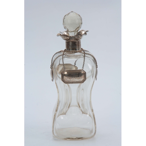 20 - A GEORGE V SILVER MOUNTED SPIRIT DECANTER AND STOPPER with quatrefoil pouring lips and pinched clear... 