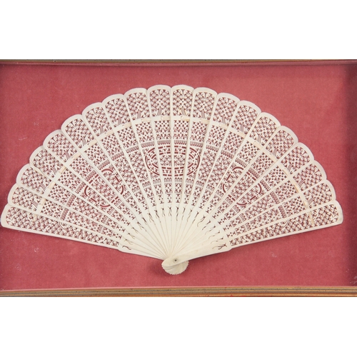 209 - A 19th CENTURY FINLEY PIERCED CHINESE CANTONESE IVORY FAN comprising 18 stick with identical guard e... 