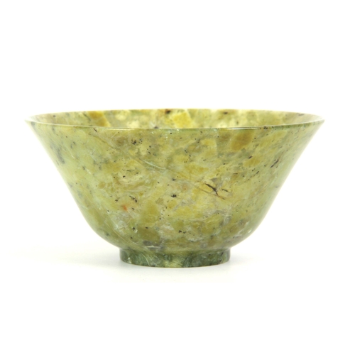 212 - A CHINESE TRANSLUCENT NEPHRITE FOOTED BOWL spinach green with emerald markings and speckled black 12... 