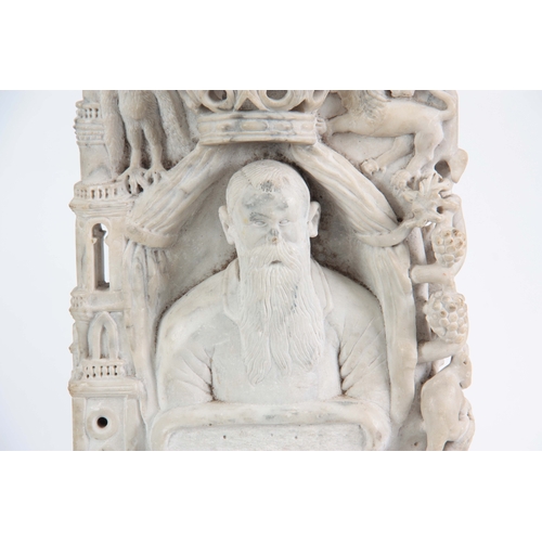 219 - AN UNUSUAL CARVED WHITE MARBLE ANGLO INDIAN BUDDHA decorated with a Royal coat of arms to the top ab... 