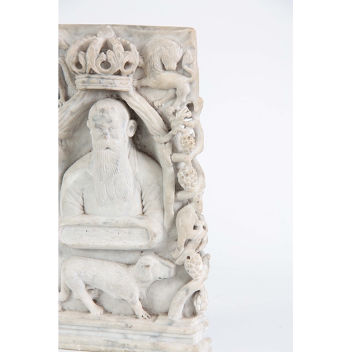 219 - AN UNUSUAL CARVED WHITE MARBLE ANGLO INDIAN BUDDHA decorated with a Royal coat of arms to the top ab... 