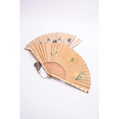 226 - TWO LATE 19TH CENTURY JAPANESE SHIBAYANA IVORY HANDLED FANS set with different raised insects to the... 