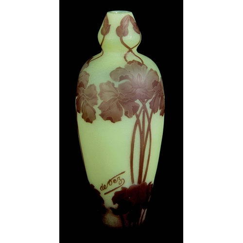 25 - AN ART NOUVEAU CAMEO GLASS VASE BY DEVEZ having a pale green ground with brown overlayed glass flora... 