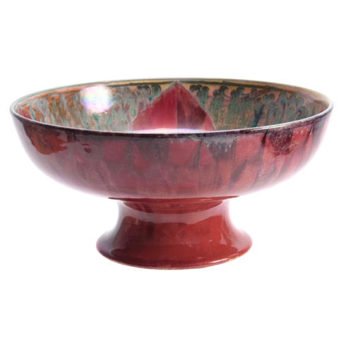 52 - A PILKINGTON'S ROYAL LANCASTRIAN FOOTED BOWL BY GLADYS ROGERS having a red and green glaze with a ye... 