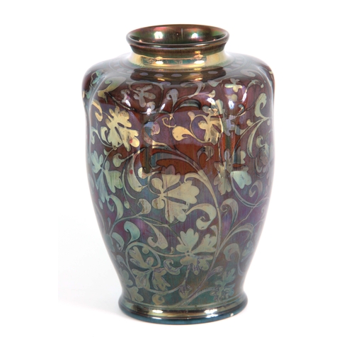 53 - AN EARLY 20TH CENTURY ROYAL LANCASTRIAN LUSTRE VASE BY GORDON FORSYTH of ovoid form with lobed shoul... 