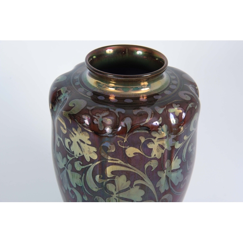 53 - AN EARLY 20TH CENTURY ROYAL LANCASTRIAN LUSTRE VASE BY GORDON FORSYTH of ovoid form with lobed shoul... 