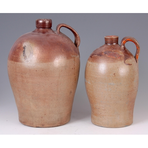 73 - TWO 18TH CENTURY 2 GALLON AND 1 GALLON FULHAM SALT GLAZED STONEWARE ALE JUGS 36cm high and 31cm high... 