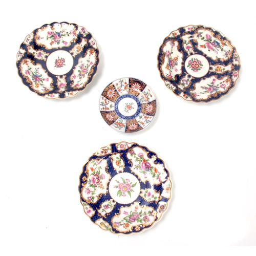 80 - A SET OF THREE FIRST PERIOD WORCESTER  POLYCHROME SCALLOP-EDGE SHALLOW DISHES richly decorated with ... 