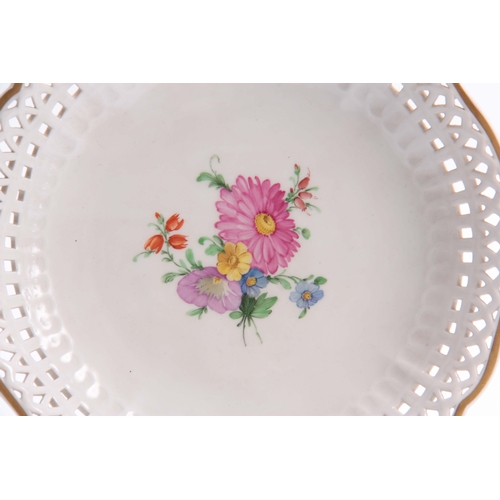 90 - A LATE 19TH CENTURY CIRCULAR KPM DISH with pierced edges and painted floral decoration 20cm diameter... 