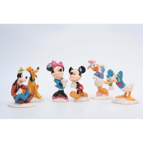 92 - A COLLECTION OF 6 MICKEY MOUSE ROYAL DOULTON FIGURES including 