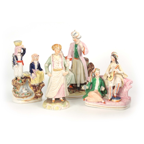 97 - A SELECTION OF FOUR 19TH CENTURY STAFFORDSHIRE FIGURES comprising  Turkish scenes, one of musicians ... 