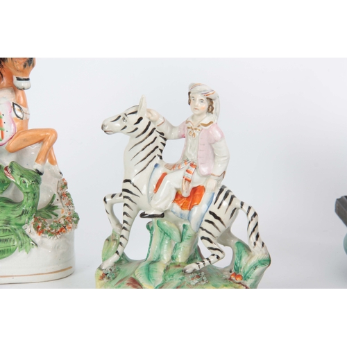 98 - A SELECTION OF THREE 19TH CENTURY STAFFORDSHIRE EQUESTRIAN FIGURES comprising of a Turkish figure ri... 