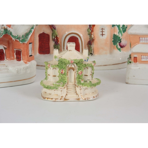 99 - A SELECTION OF FOUR 19TH CENTURY STAFFORDSHIRE HOUSE FIGURINES comprising of one with clocktower - 2... 