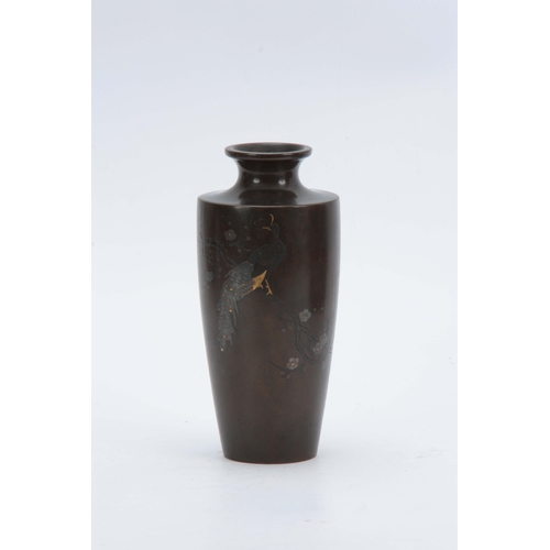 235 - A JAPANESE MEIJI PERIOD BRONZE AND INLAID MIXED METAL TAPERING VASE depicting a peacock sat in branc... 