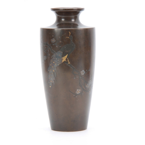 235 - A JAPANESE MEIJI PERIOD BRONZE AND INLAID MIXED METAL TAPERING VASE depicting a peacock sat in branc... 