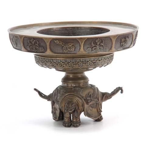 237 - AN ORNATE 19TH CENTURY CHINESE CAST BRONZE CENSOR BASE the foot formed as three elephants heads divi... 