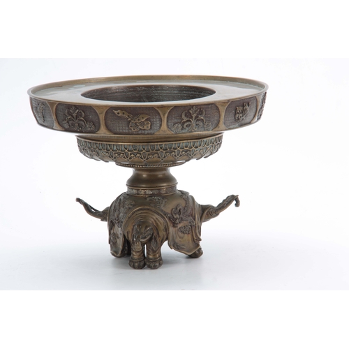 237 - AN ORNATE 19TH CENTURY CHINESE CAST BRONZE CENSOR BASE the foot formed as three elephants heads divi... 