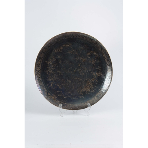 245 - A MEIJI PERIOD JAPANESE PATINATED BRONZE CHARGER WITH LUSTRE FINISH having raised decoration depicti... 