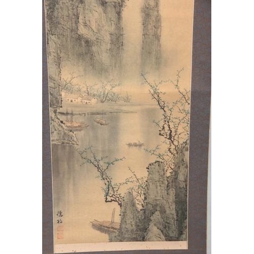 259 - TWO MEIJI PERIOD JAPANESE WATERCOLOUR HANGING SCROLLS depicting mountain scenes with script and sign... 