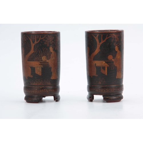 265 - A PAIR OF 18TH CENTURY CHINESE LACQUER WORK BRUSH POTS decorated with continuous figural garden scen... 