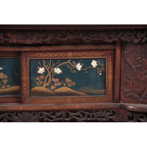 281 - A JAPANESE MEIJI PERIOD COLLECTORS CABINET having fine Chinoiserie decorated panels inlaid with moth... 