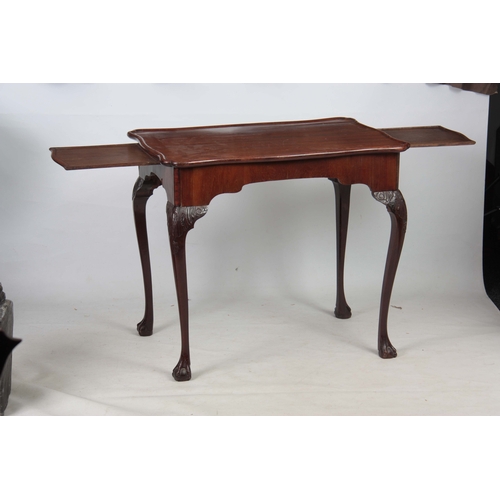 283 - A 19TH CENTURY CHINESE HARDWOOD LOW OCCASIONAL TABLE with panelled top and shaped scroll carved base... 