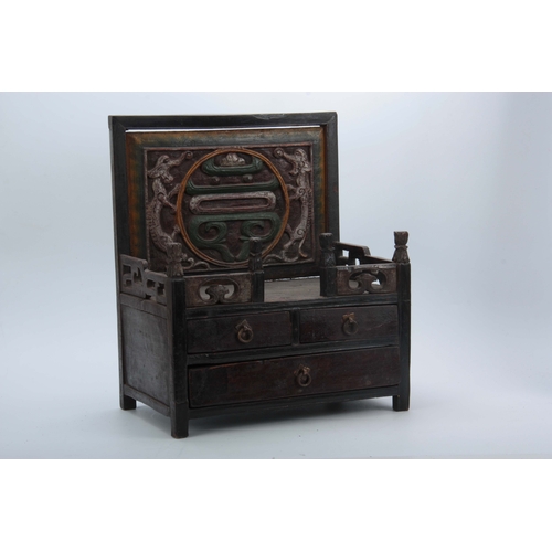 284 - A 19TH CENTURY CHINESE HARDWOOD ALTAR CABINET with carved polychrome panelled back and fret-cut gall... 