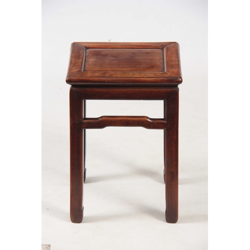 285 - A 19TH CENTURY CHINESE HARDWOOD JARDINIERE STAND with panelled top and square legs joined by shaped ... 