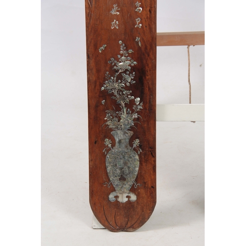 287 - A PAIR OF LATE 19th CENTURY CHINESE HARDWOOD AND MOTHER-OF-PEARL INLAID WALL PLAQUES having floral c... 