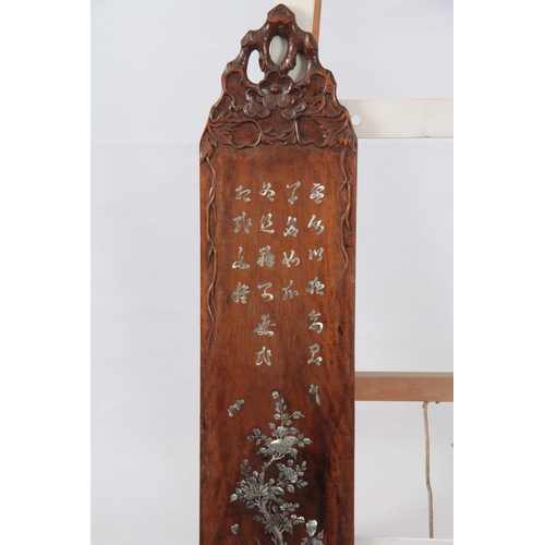 287 - A PAIR OF LATE 19th CENTURY CHINESE HARDWOOD AND MOTHER-OF-PEARL INLAID WALL PLAQUES having floral c... 