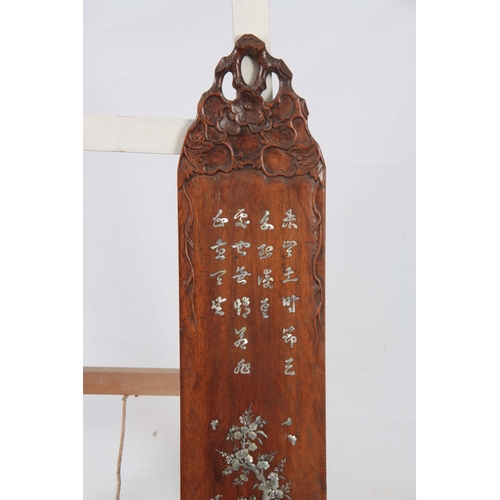 287 - A PAIR OF LATE 19th CENTURY CHINESE HARDWOOD AND MOTHER-OF-PEARL INLAID WALL PLAQUES having floral c... 