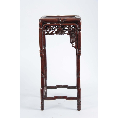 291 - A SMALL 19th CENTURY CHINESE HARDWOOD PLANT STAND of simulated bamboo design with pierced floral fre... 