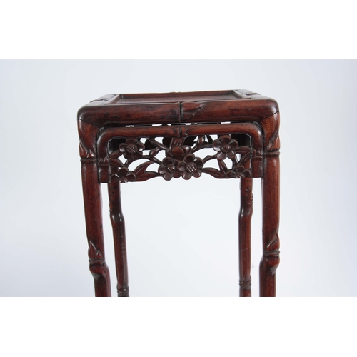 291 - A SMALL 19th CENTURY CHINESE HARDWOOD PLANT STAND of simulated bamboo design with pierced floral fre... 