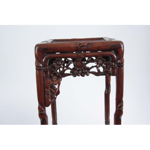 291 - A SMALL 19th CENTURY CHINESE HARDWOOD PLANT STAND of simulated bamboo design with pierced floral fre... 