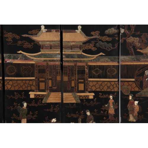 292 - A 19TH CENTURY CHINESE BLACK LACQUER SIX PANEL FOLDING SCREEN with raised pagoda and tree-lined land... 