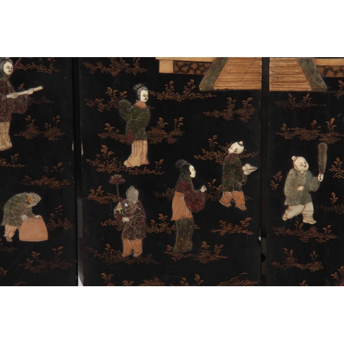 292 - A 19TH CENTURY CHINESE BLACK LACQUER SIX PANEL FOLDING SCREEN with raised pagoda and tree-lined land... 