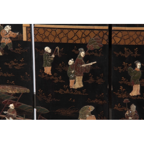 292 - A 19TH CENTURY CHINESE BLACK LACQUER SIX PANEL FOLDING SCREEN with raised pagoda and tree-lined land... 