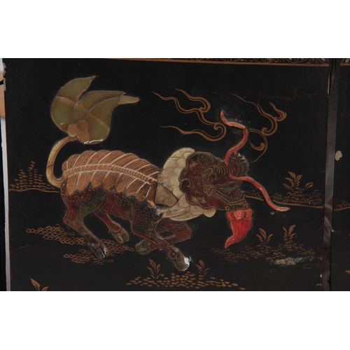 292 - A 19TH CENTURY CHINESE BLACK LACQUER SIX PANEL FOLDING SCREEN with raised pagoda and tree-lined land... 