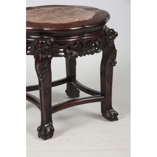 298 - A 19TH CENTURY CHINESE HARDWOOD JARDINIERE STAND with inset marble top, mounted on a pierced carved ... 