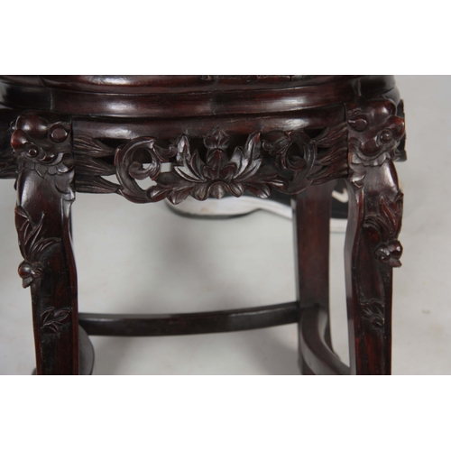 298 - A 19TH CENTURY CHINESE HARDWOOD JARDINIERE STAND with inset marble top, mounted on a pierced carved ... 