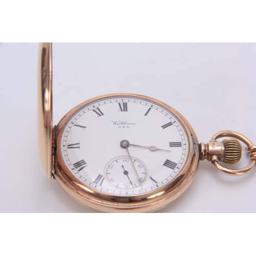 370 - A 9CT GOLD FULL HUNTER WALTHAM POCKET WATCH WITH 9CT GOLD FOB the spring-loaded hinged cover opening... 