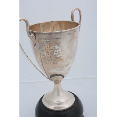 373 - A GEORGE V SILVER TWO HANDLED MASONIC PRESENTATION GOLF TROPHY bearing the badge of the 