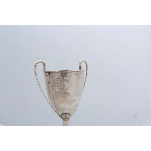 373 - A GEORGE V SILVER TWO HANDLED MASONIC PRESENTATION GOLF TROPHY bearing the badge of the 