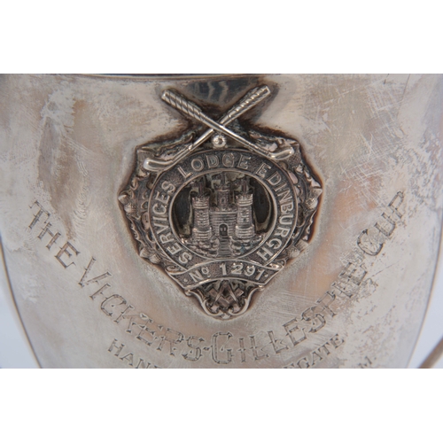 373 - A GEORGE V SILVER TWO HANDLED MASONIC PRESENTATION GOLF TROPHY bearing the badge of the 