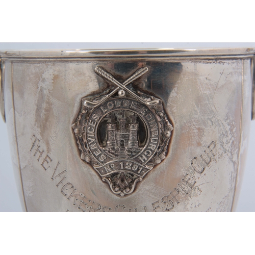 373 - A GEORGE V SILVER TWO HANDLED MASONIC PRESENTATION GOLF TROPHY bearing the badge of the 