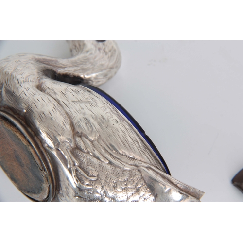 383 - A CASED PAIR OF FIGURAL SILVER SALTS MODELLED AS DUCKS WITH SHOVEL SHAPED SALT SPOONS hallmarked for... 