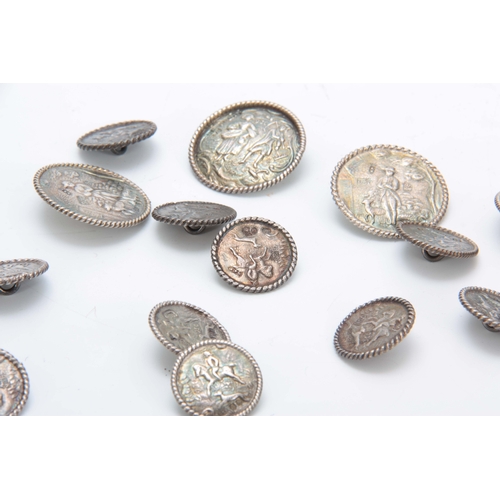 389 - A SET OF LATE 19th CENTURY SILVER BUTTONS having four large buttons, 34mm diameter, and twelve small... 