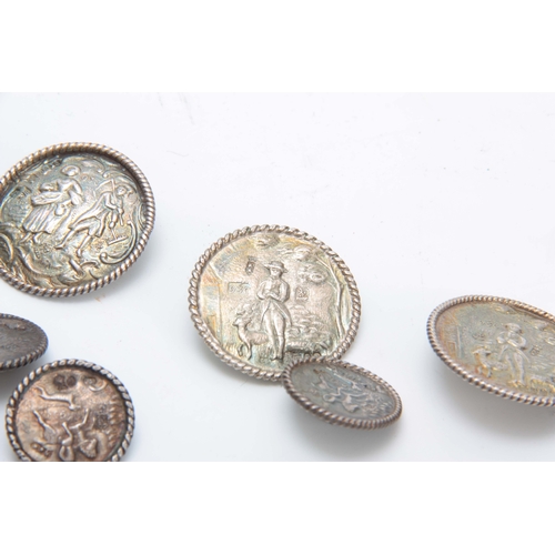 389 - A SET OF LATE 19th CENTURY SILVER BUTTONS having four large buttons, 34mm diameter, and twelve small... 